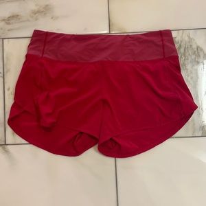 Dark red Lululemon run times 4 inch shorts